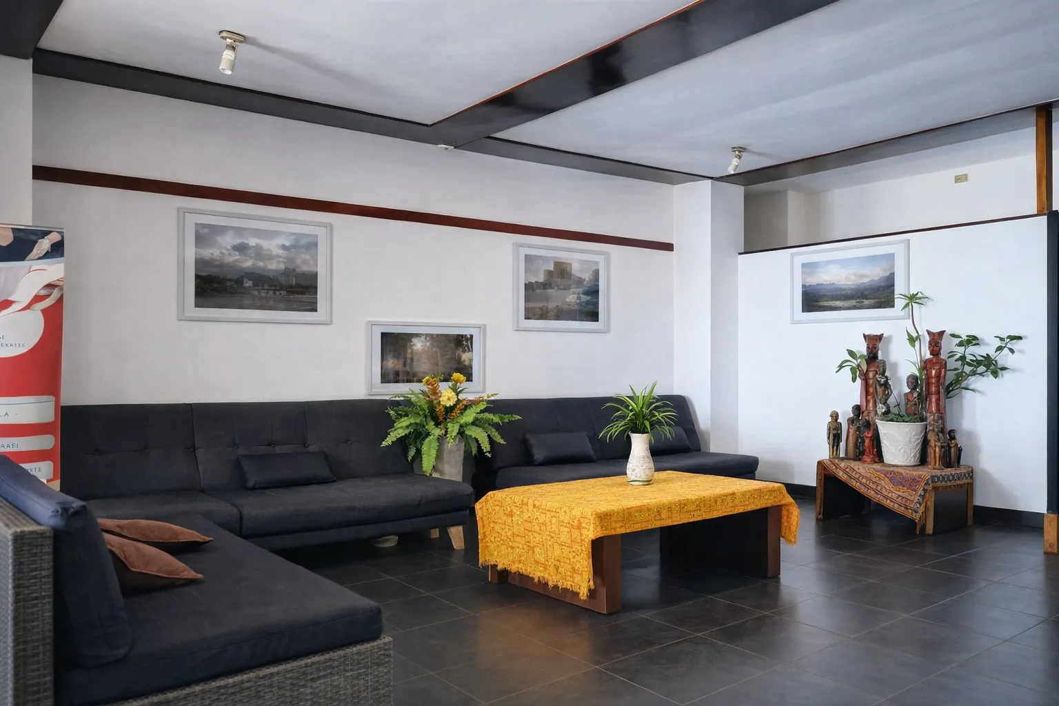 Hotel Esplanada lobby with sofas and Timorese art