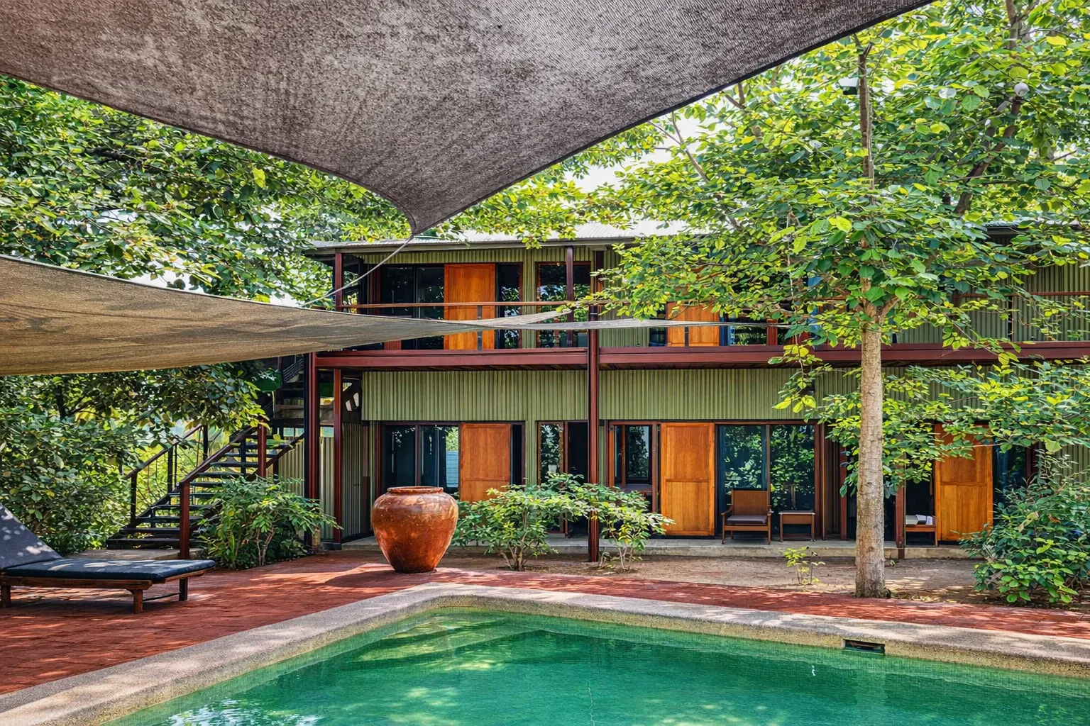 Aerial view of Hotel Esplanada building with swimming pool in Dili