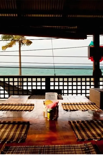 Table set for dinner with ocean view at Sea Breeze Restaurant