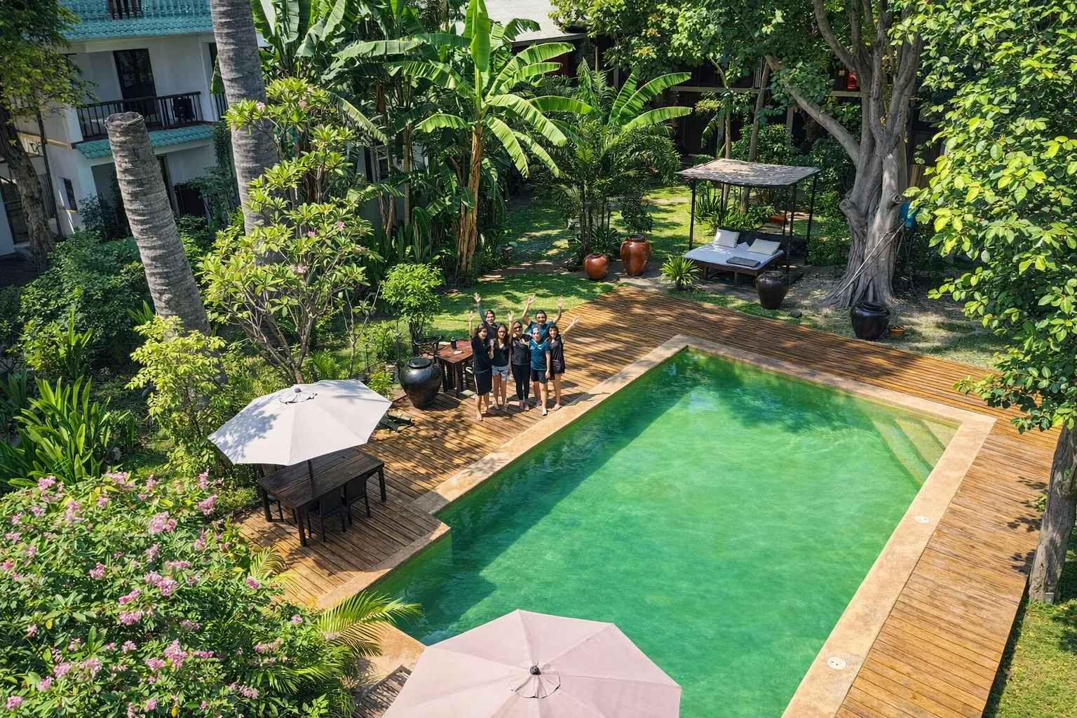 Pool deck and sun loungers at Hotel Esplanada Dili
